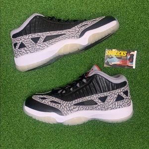 Jordan 11 low “Black Cement”